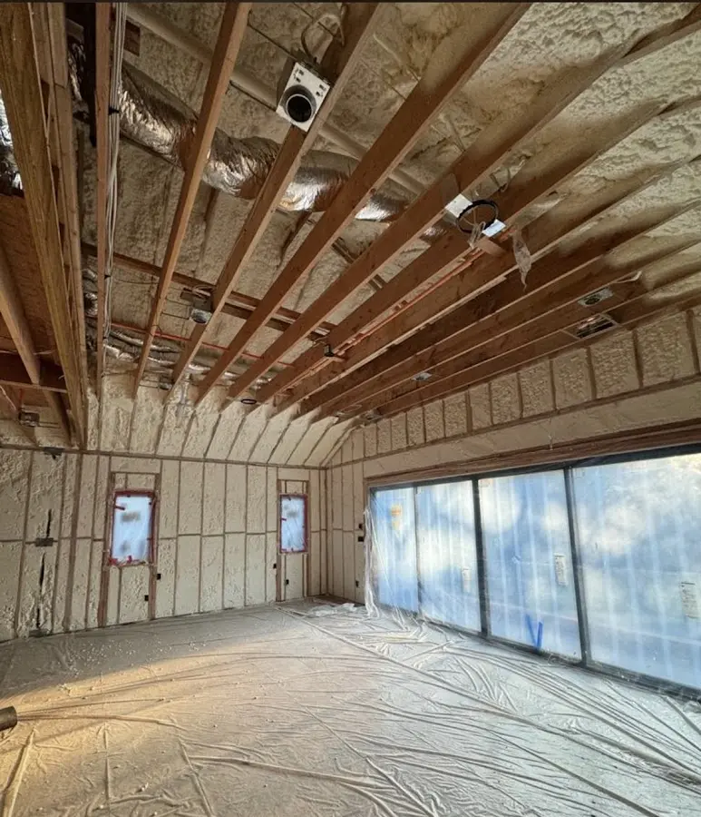 Interior walls and ceiling insulated with spray foam during new construction in Sanibel